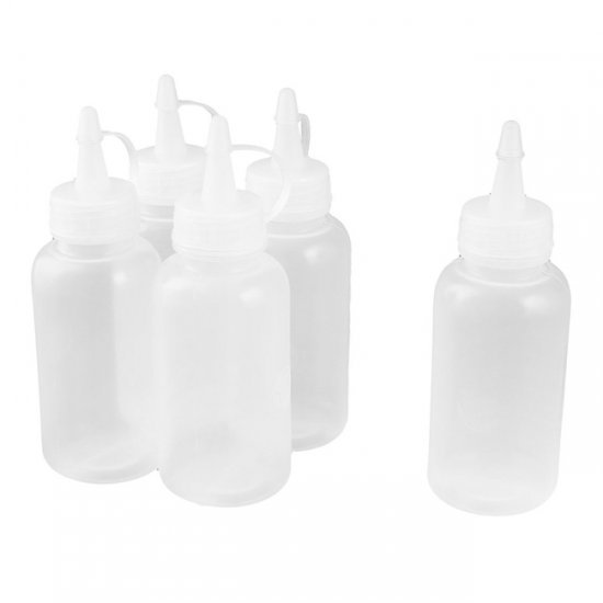 Doseerflesje Kunststof 250 ml. Doseerflesje met tuit, 250 ml. inhoud uit kunststof in de kleur doorzichtig. Geschikt vanaf 3+.