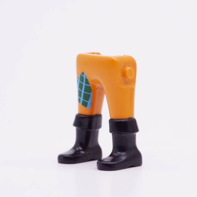 Playmobil 90010009 Benen Oranje Broek Zw Laarzen - Legs Orange Pants Bl Boots ,  groot uit kunststof in de kleur oranje. Geschikt vanaf 3+.