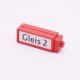 Playmobil 30612420 Bord Treinstation - Gleis 2 - Sign Train Station ,  groot uit kunststof in de kleur rood. Geschikt vanaf 3+.