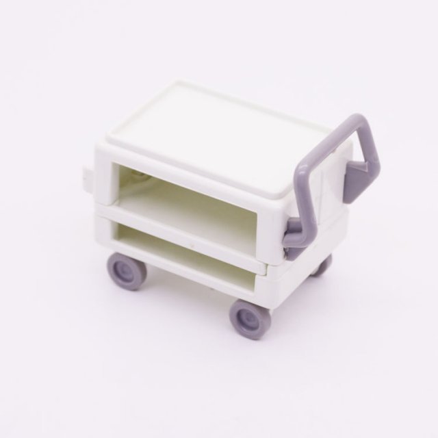 Playmobil 30605510 Trolley m Draaiplateau - W - Cart w Swing Out Shelf ,  groot uit kunststof in de kleur wit. Geschikt vanaf 3+.